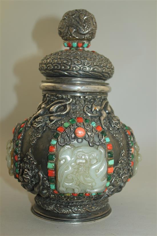 A Tibetan silver, jade, coral, malachite and turquoise mounted ritual jar and cover, 19th century, 25.5cm